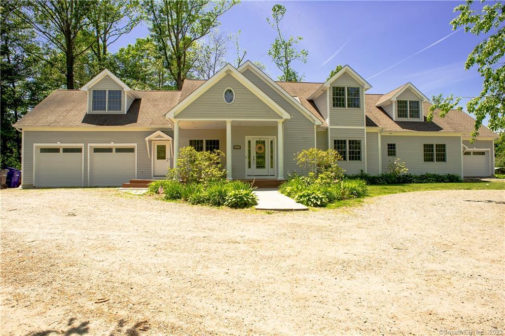80 Prange Road Brookfield, CT 06804 - Photo 1 of 1 a front view of a house with a garden