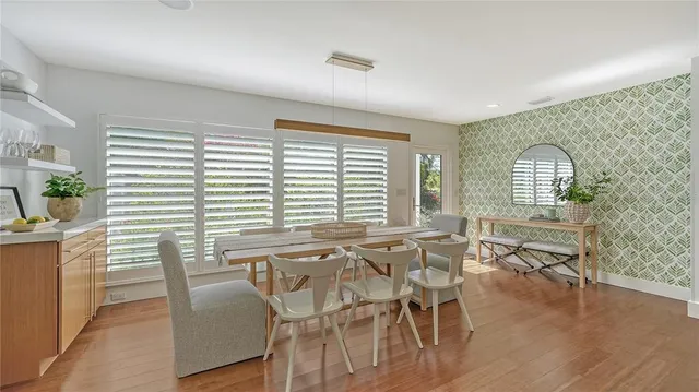 a large kitchen with lots of counter top space and living room
