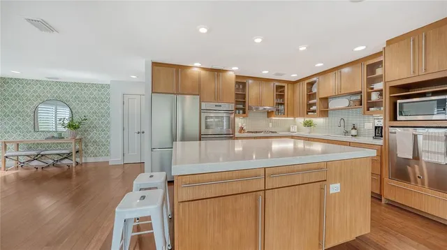 a bedroom with a bed and a cabinets