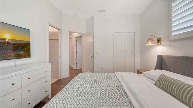 a view of a patio with table and chairs and potted plants