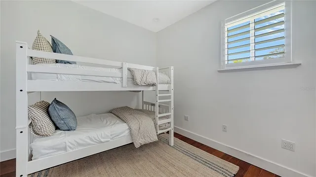 an aerial view of a house with a lake view