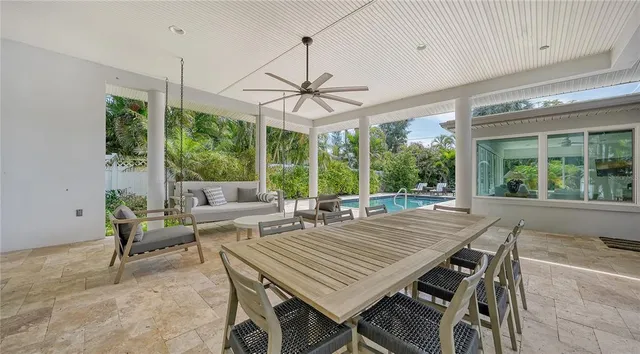 an aerial view of a house with a lake view