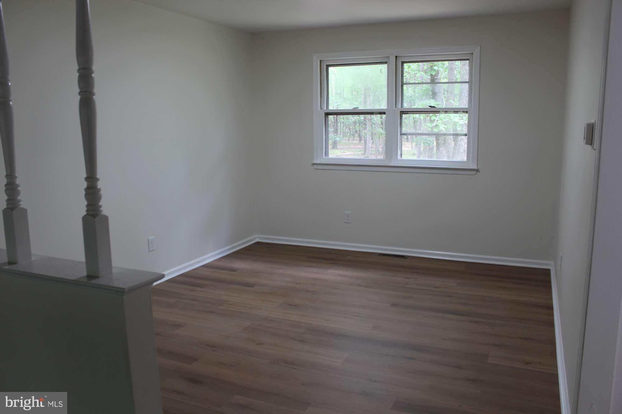 7 Deer Trail Tabernacle, NJ 08088 - Photo 13 of 31 an empty room with wooden floor and windows