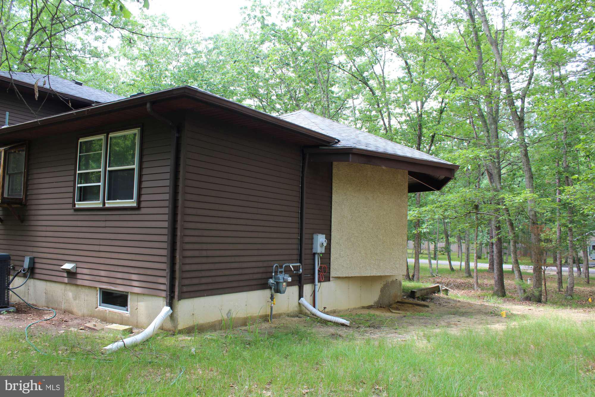 7 Deer Trail Tabernacle, NJ 08088 - Photo 4 of 31 a backyard of a house with seating space