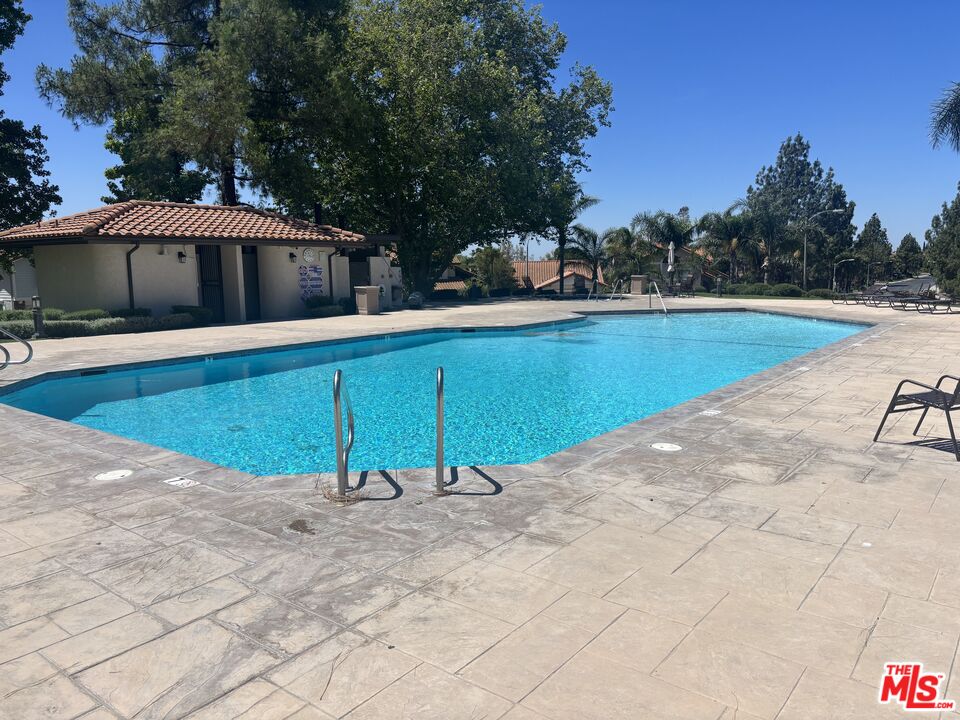 19528 Eagle Ridge Lane Porter Ranch, CA 91326 - Photo 16 of 20 a view of swimming pool with a yard