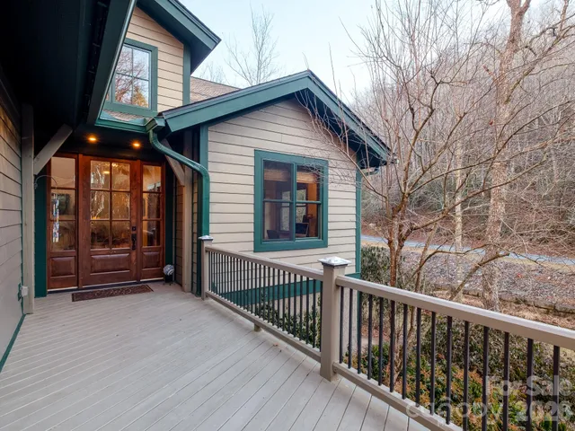 a living room with fireplace furniture and a fireplace