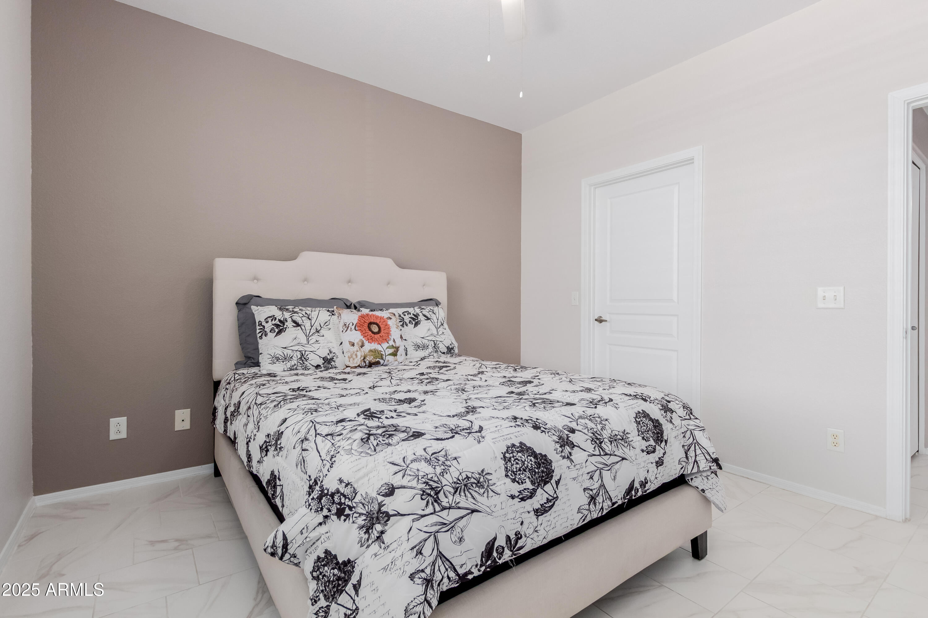 1941 South Pierpont Drive, Unit 1114 Mesa, AZ 85206 - Photo 12 of 34 a bedroom with a bed and a window