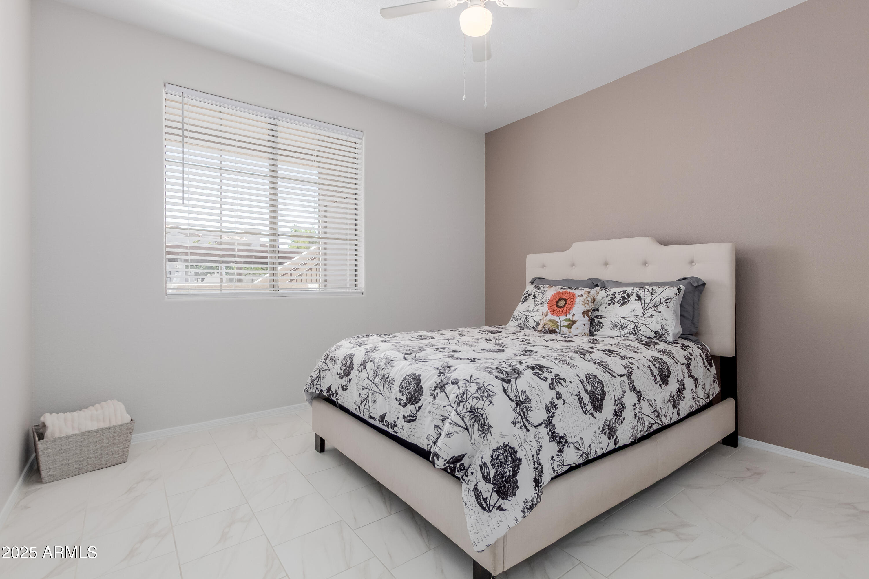 1941 South Pierpont Drive, Unit 1114 Mesa, AZ 85206 - Photo 14 of 34 a bed sitting in a bedroom next to a window