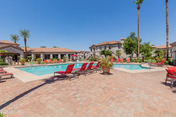 swimming pool with outdoor seating