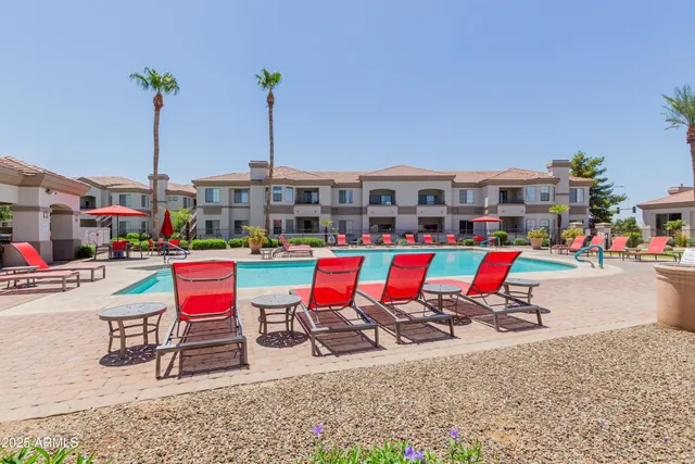 a childrens park with lots of swings and slides