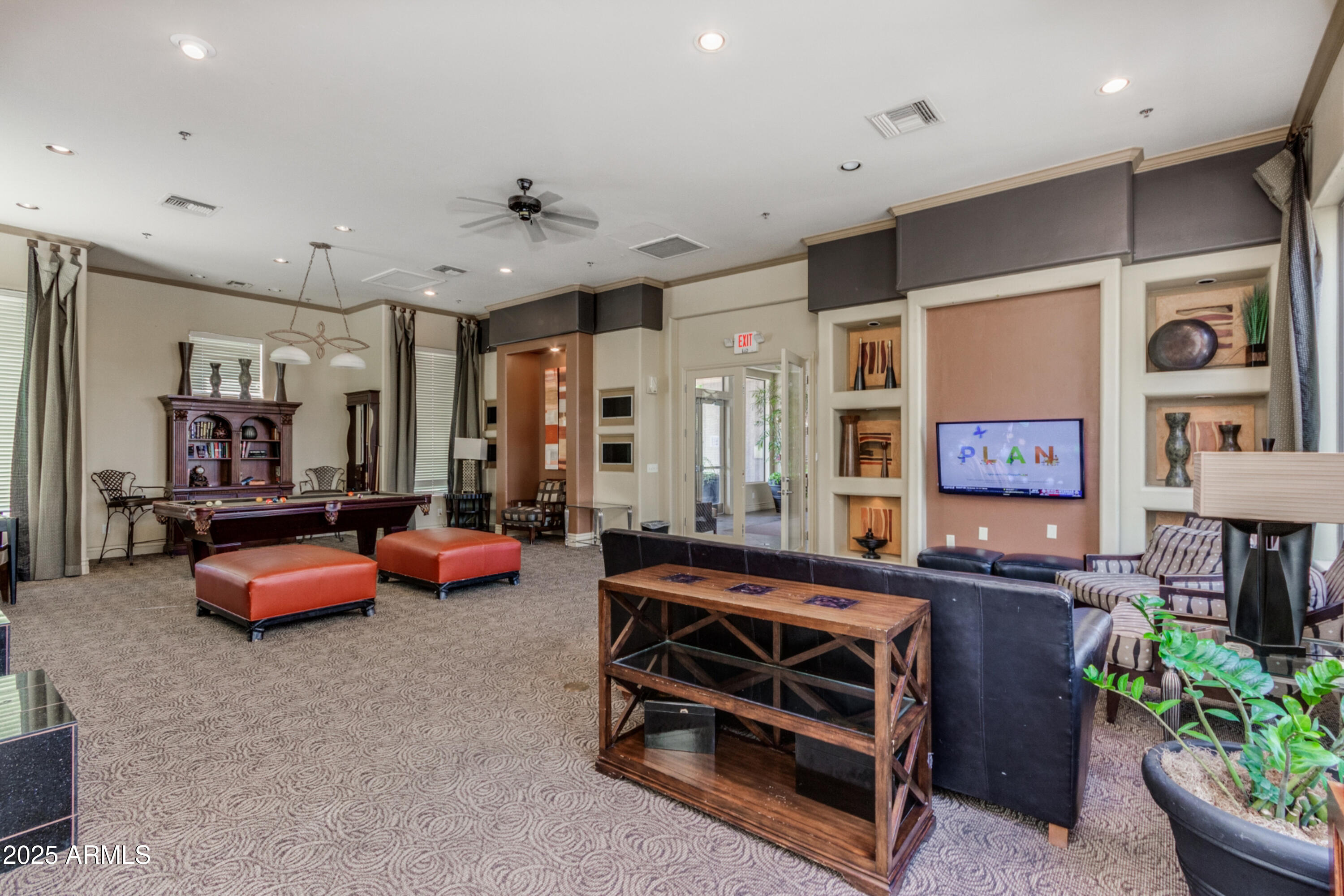 1941 South Pierpont Drive, Unit 1114 Mesa, AZ 85206 - Photo 26 of 34 a living room with furniture and a flat screen tv