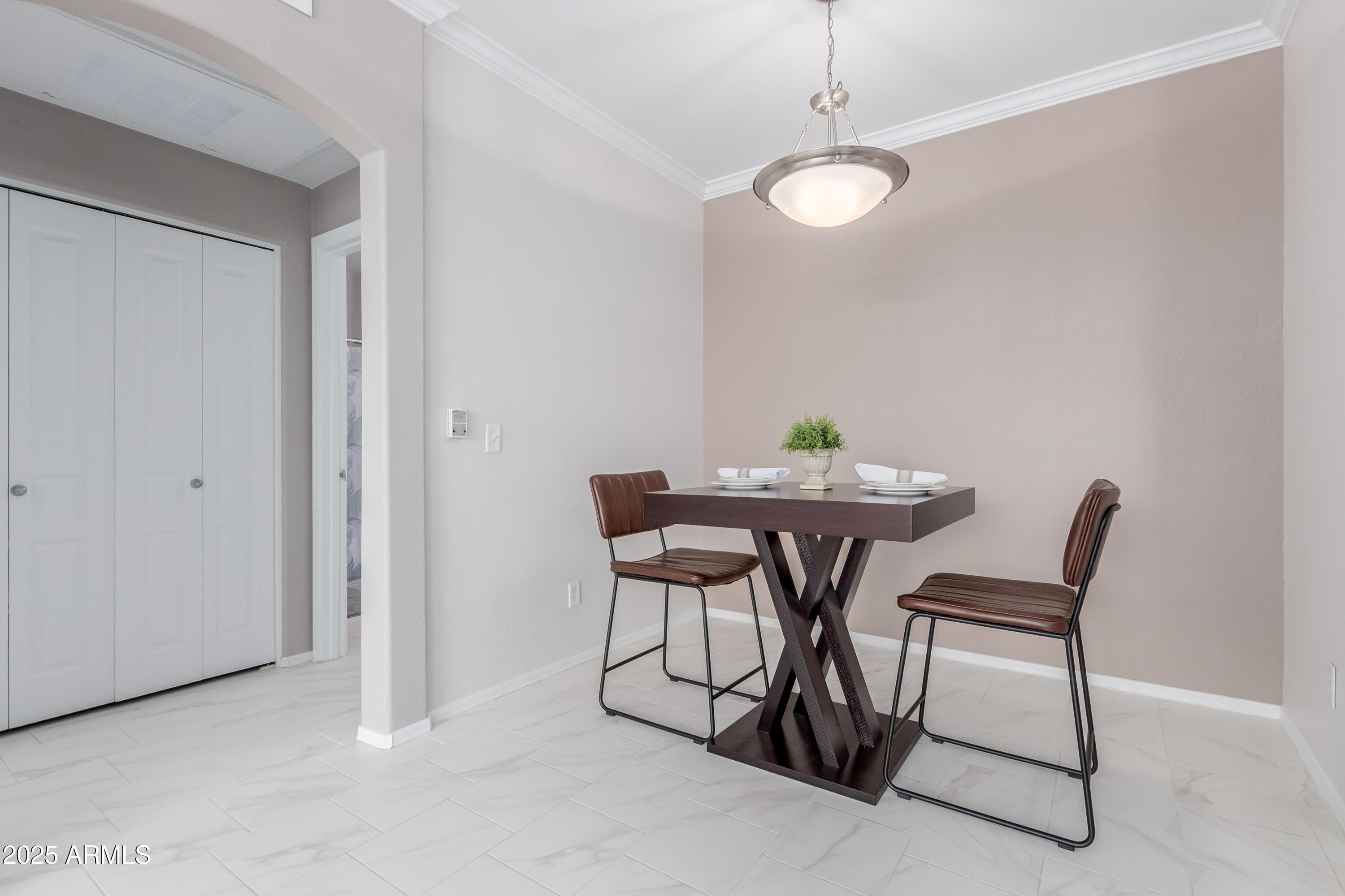 1941 South Pierpont Drive, Unit 1114 Mesa, AZ 85206 - Photo 8 of 34 a dining room with furniture and window
