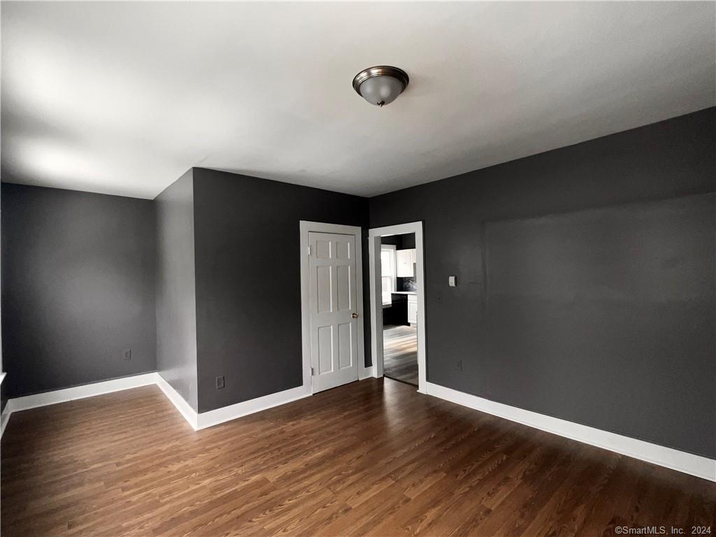 552 Winthrop Avenue New Haven, CT 06511 - Photo 7 of 12 a view of an empty room with wooden floor