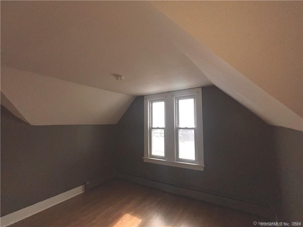 552 Winthrop Avenue New Haven, CT 06511 - Photo 10 of 12 an empty room with a windows