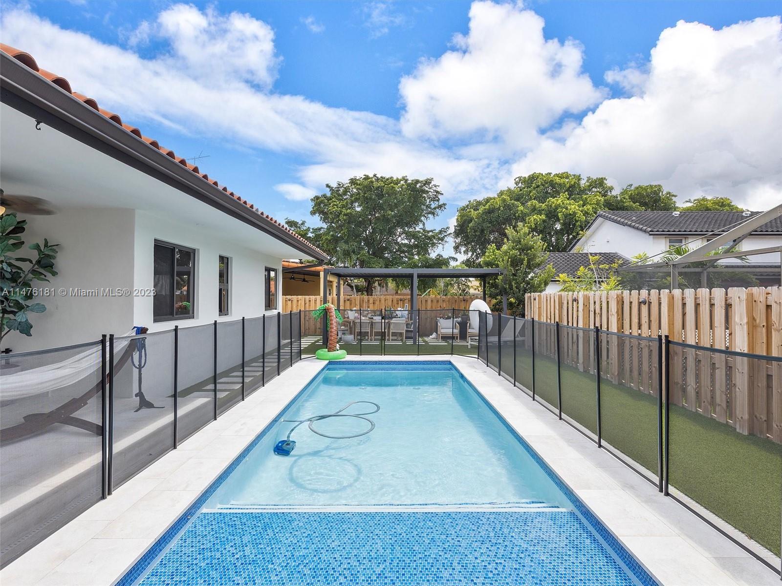 3776 Southwest 107th Court Miami, FL 33165 - Photo 38 of 45 swimming pool view from balcony