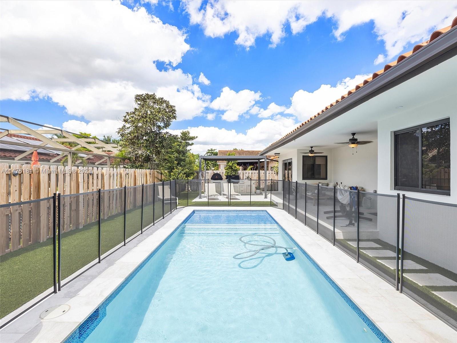3776 Southwest 107th Court Miami, FL 33165 - Photo 39 of 45 a view of a patio with swimming pool