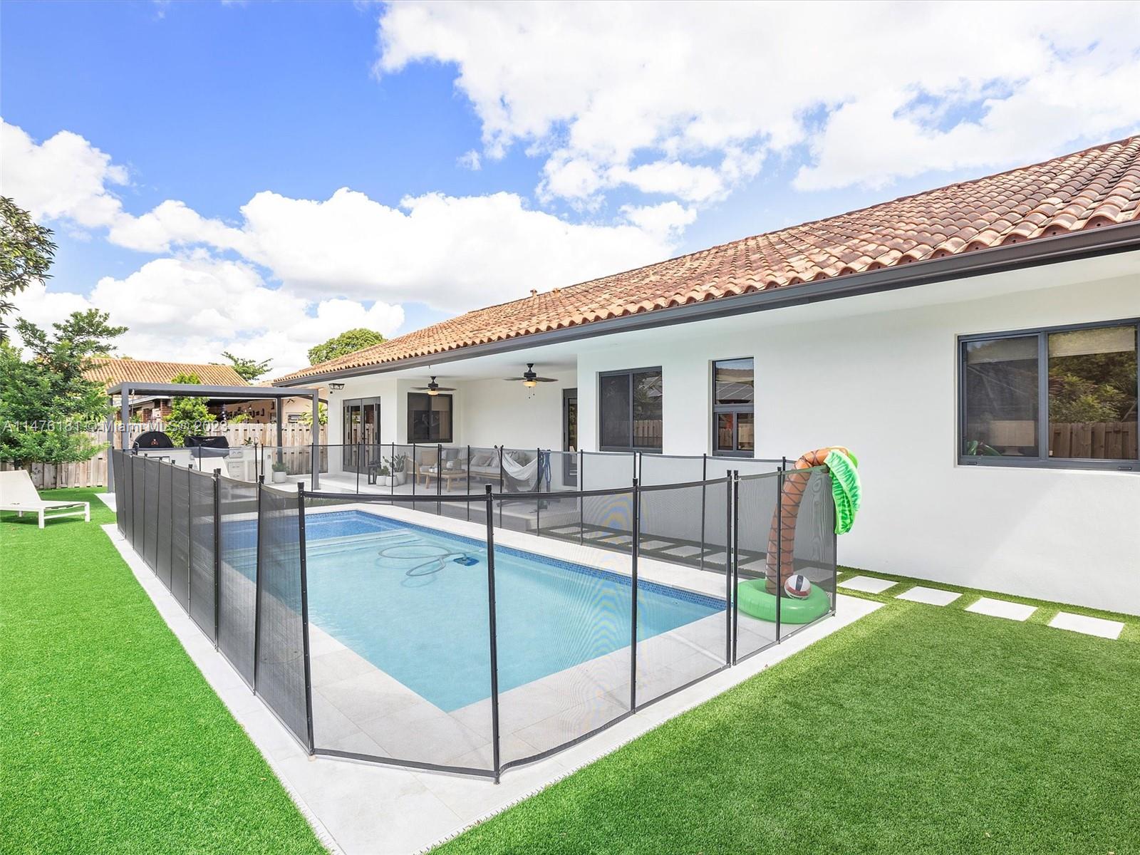 3776 Southwest 107th Court Miami, FL 33165 - Photo 40 of 45 a view of a house with backyard and sitting area