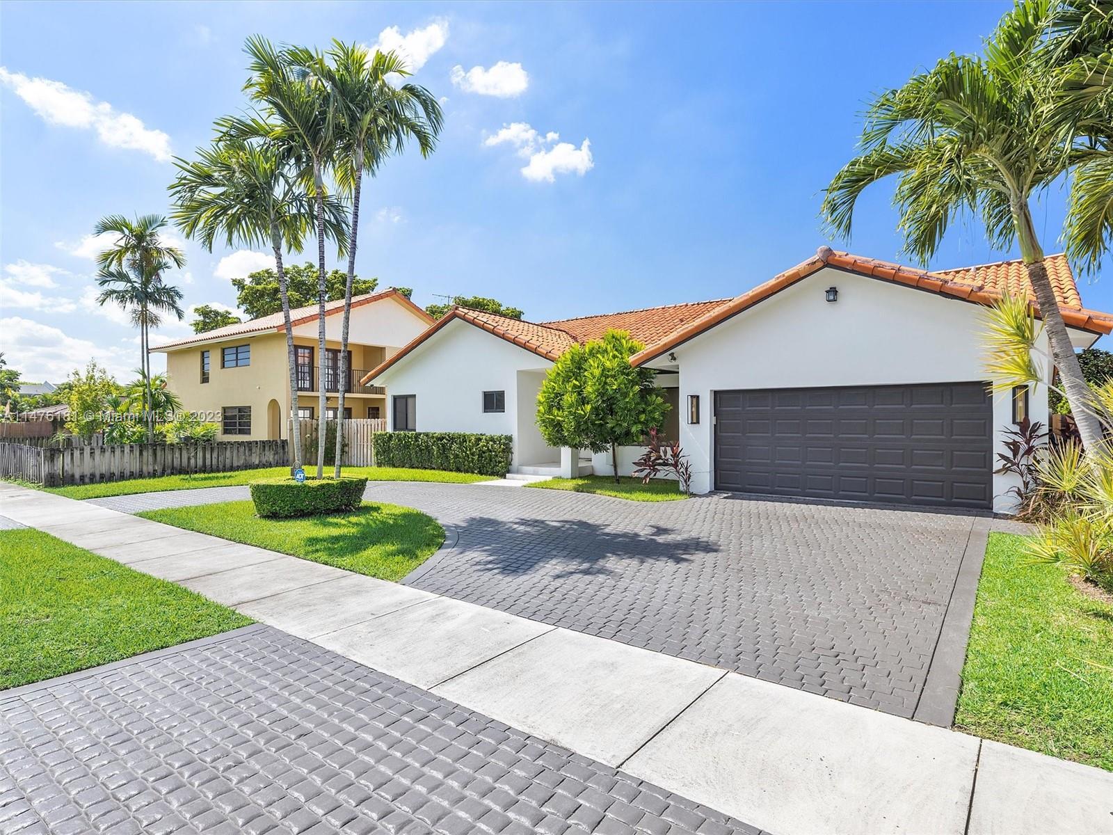 3776 Southwest 107th Court Miami, FL 33165 - Photo 45 of 45 a front view of house with yard and green space
