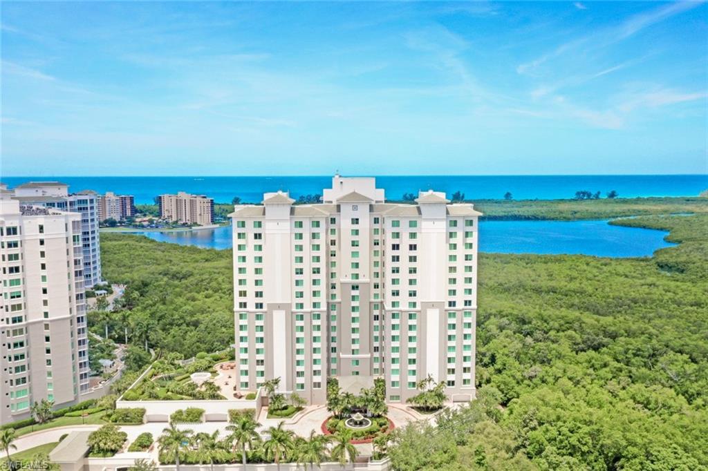 265 Indies Way, Unit T1 Naples, FL 34110 - Photo 11 of 21 a view of a city with tall buildings