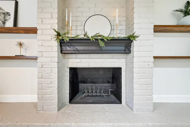 a view of a kitchen with a fireplace