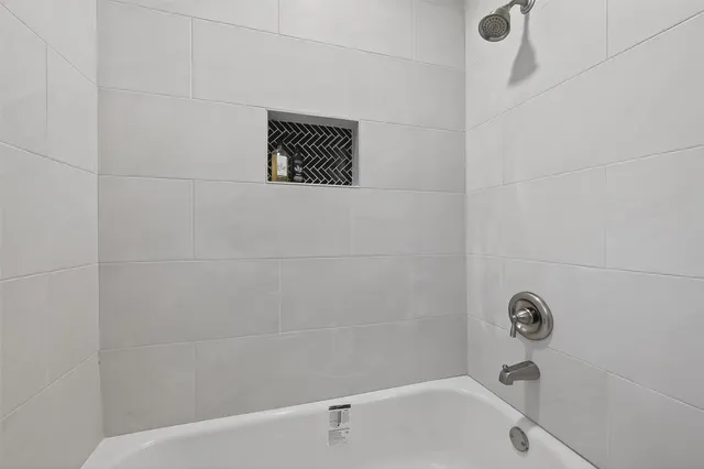 a bathroom with a bathtub