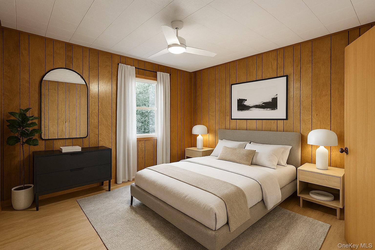 74 Swinging Bridge Estate Road Monticello, NY 12701 - Photo 21 of 36 a bedroom with a bed and a painting on the wall