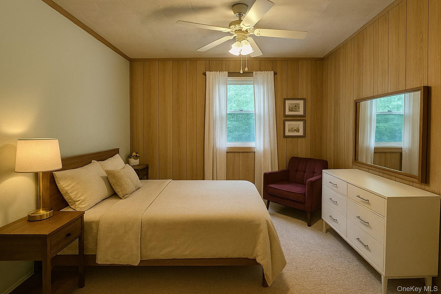 74 Swinging Bridge Estate Road Monticello, NY 12701 - Photo 24 of 36 a bedroom with a bed and a chandelier