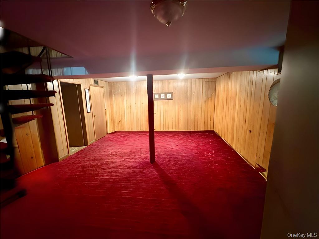 74 Swinging Bridge Estate Road Monticello, NY 12701 - Photo 28 of 36 a view of a livingroom with a staircase