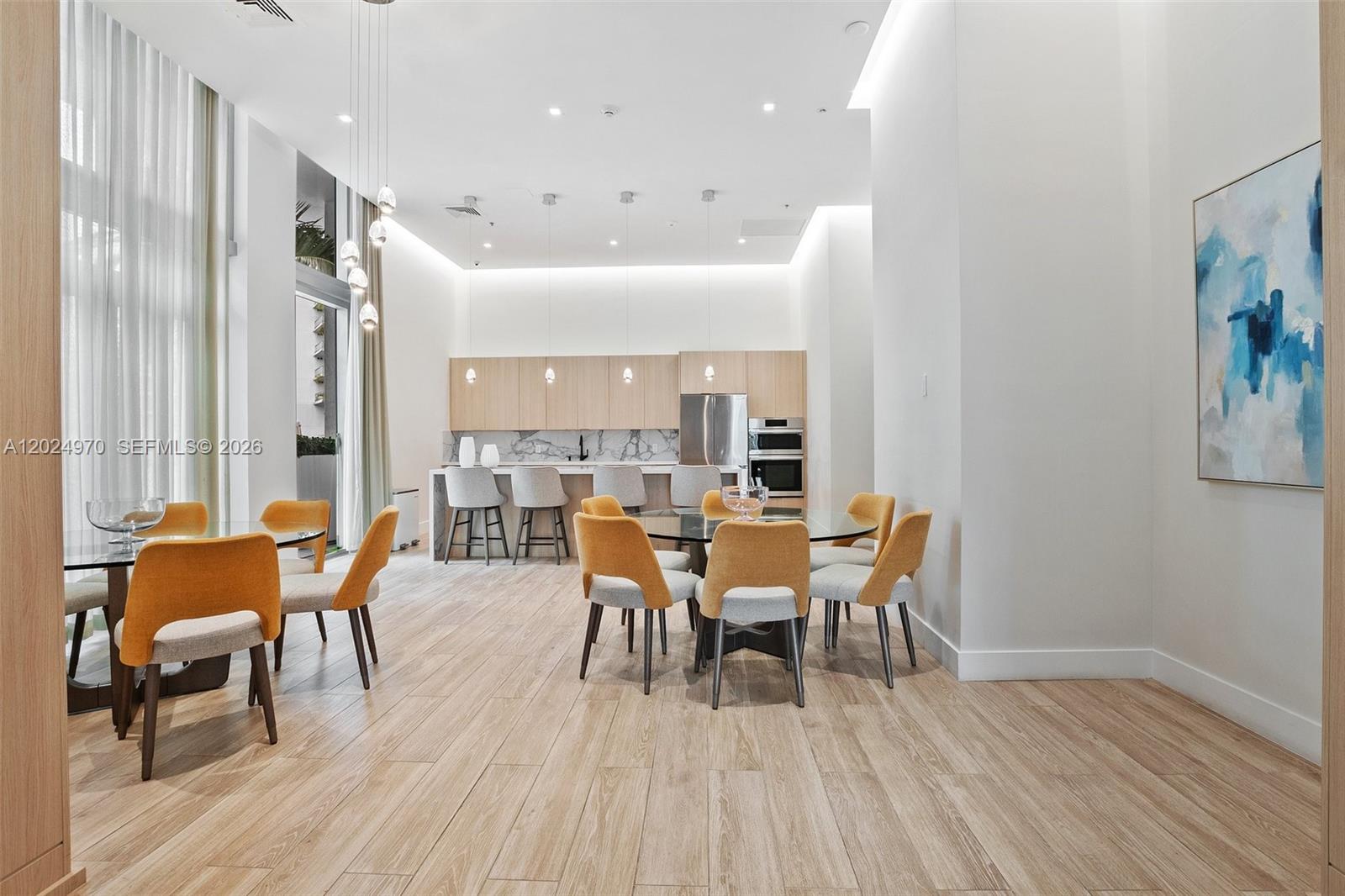 90 Southwest 3rd Street, Unit 3810 Miami, FL 33130 - Photo 44 of 45 a dining room with furniture and wooden floor