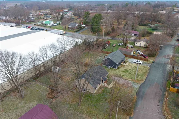 a view of yard from a tree
