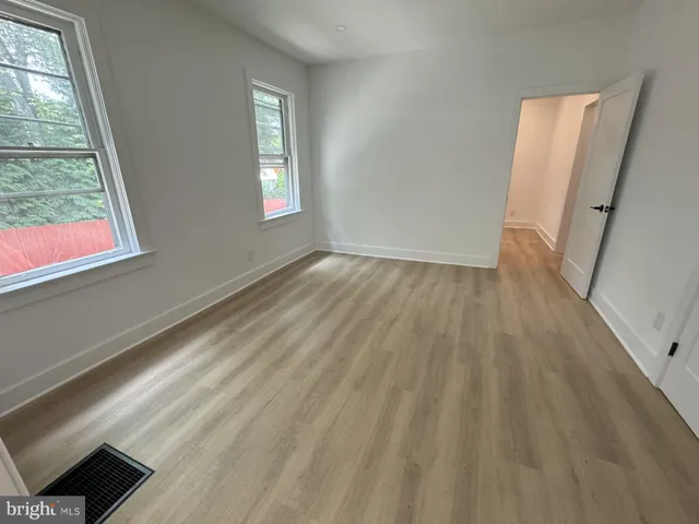 a view of an empty room and window