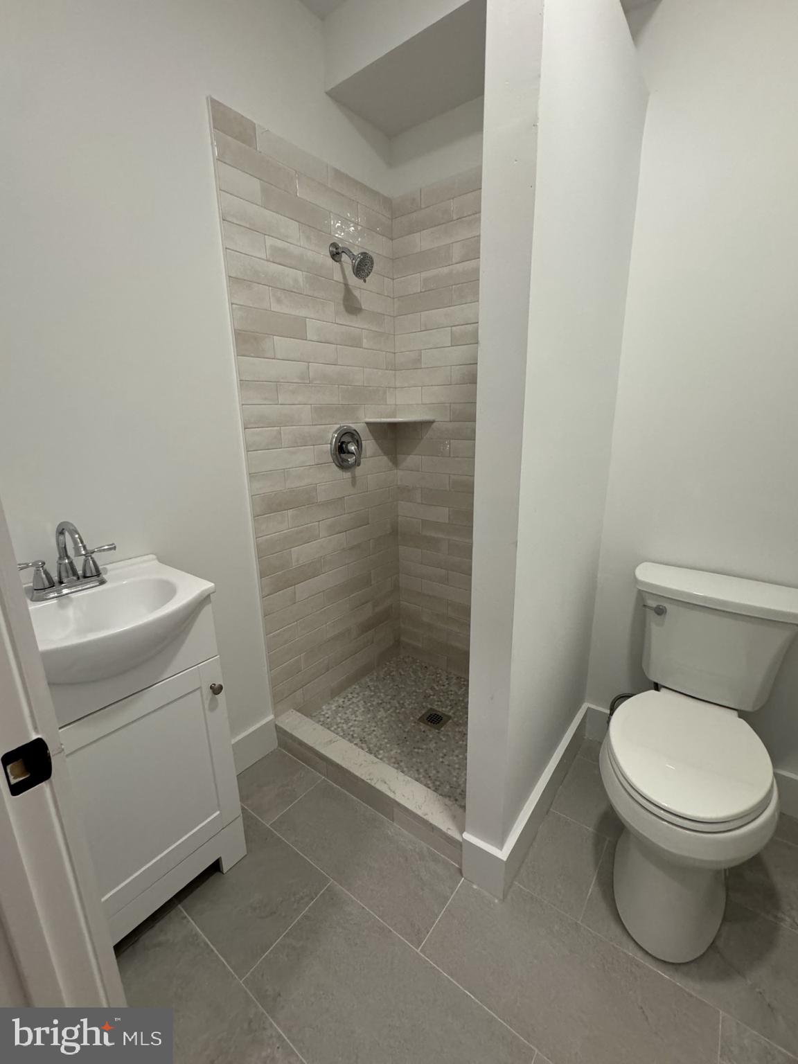 37 Bank Street, Unit 1 Princeton, NJ 08542 - Photo 3 of 4 a bathroom with a toilet sink and shower