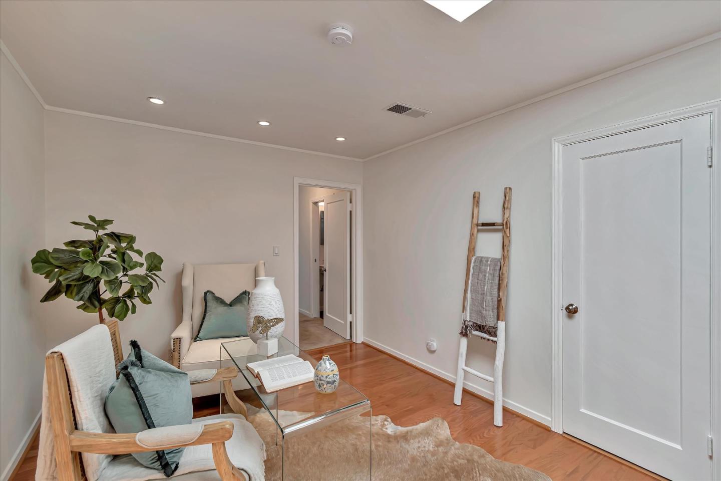 714 Cherry Avenue San Bruno, CA 94066 - Photo 14 of 29 a living room with furniture and a potted plant