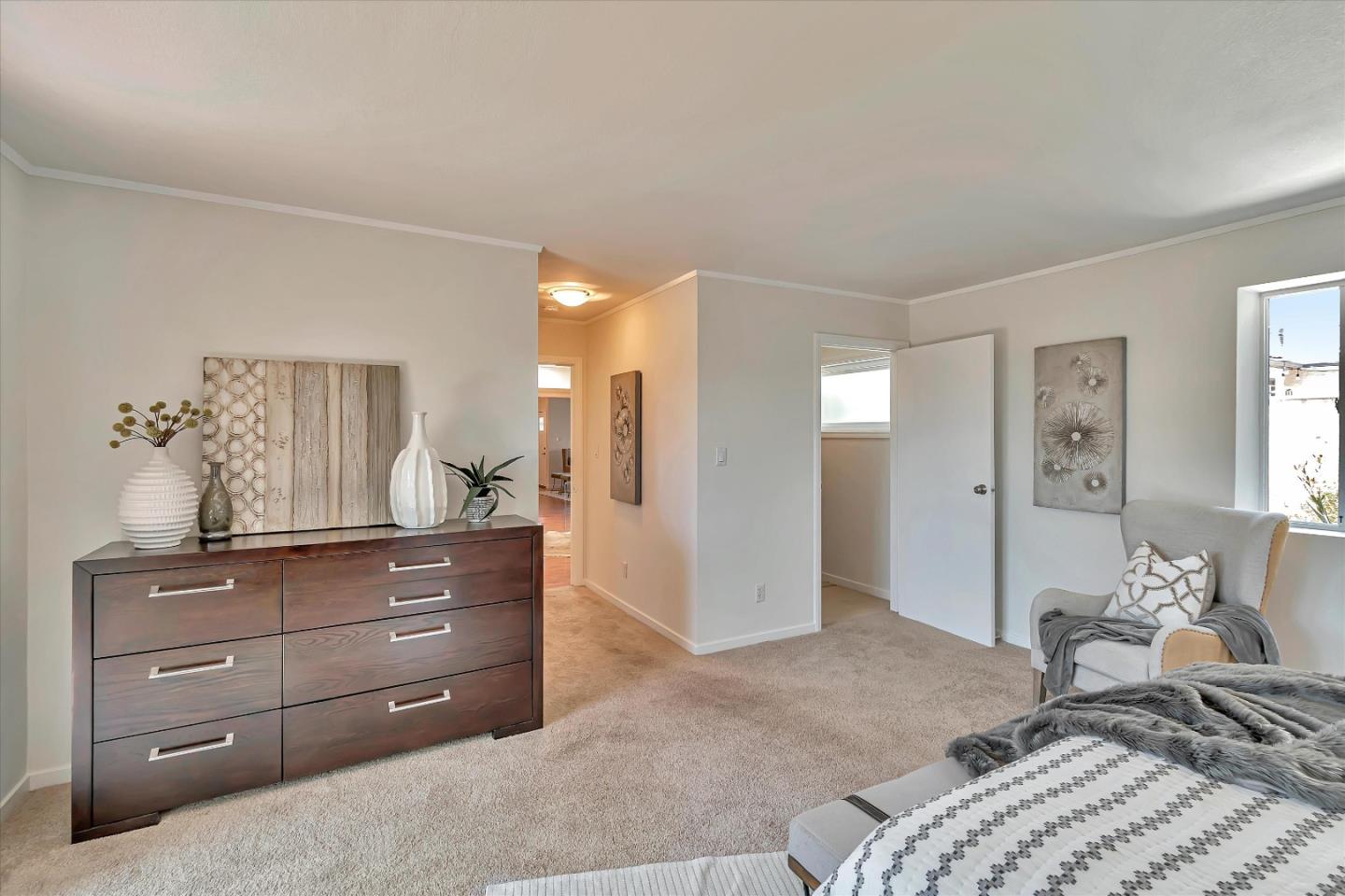 714 Cherry Avenue San Bruno, CA 94066 - Photo 16 of 29 a bedroom with a bed and a mirror