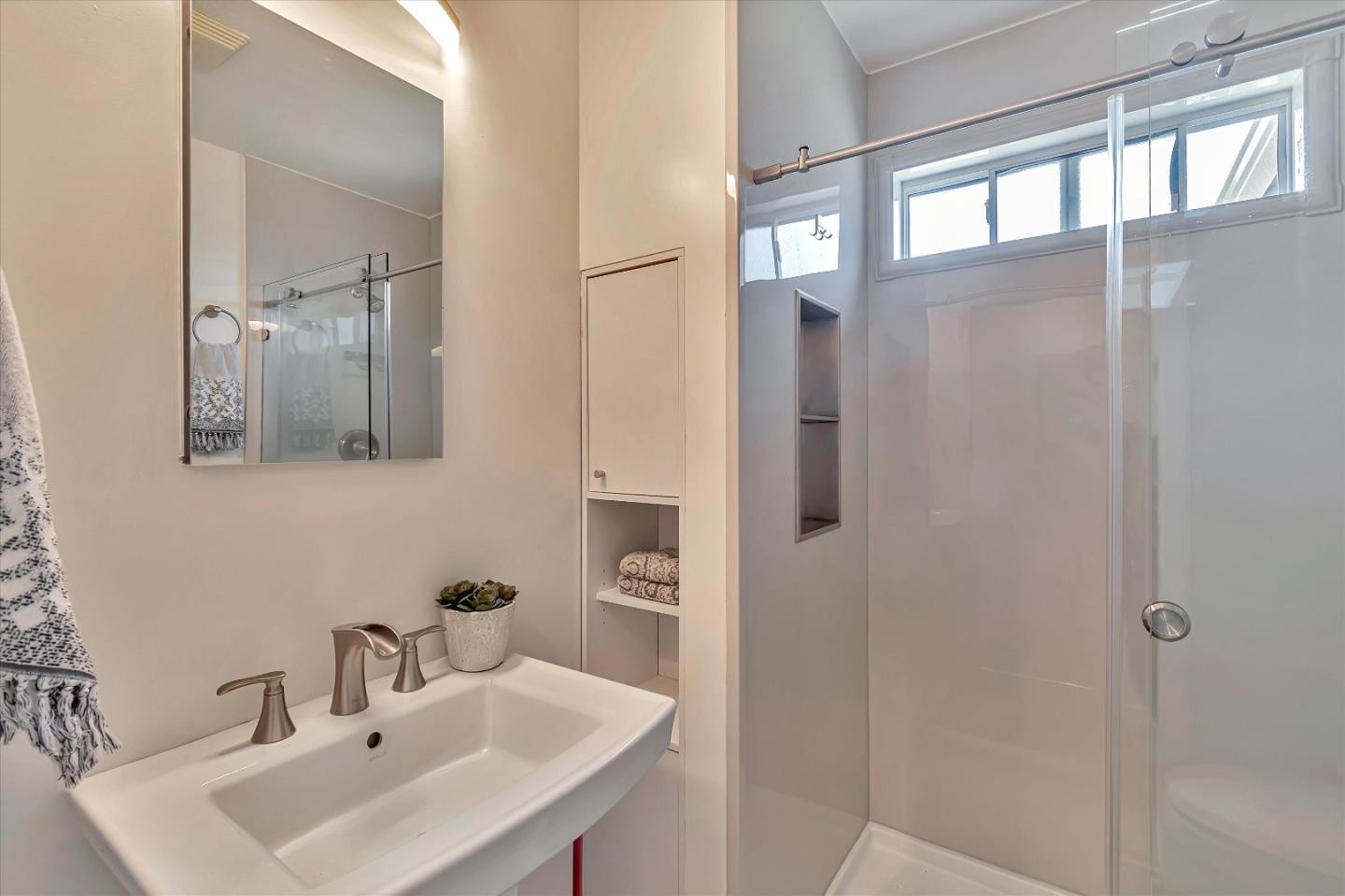 714 Cherry Avenue San Bruno, CA 94066 - Photo 18 of 29 a bathroom with a sink and mirror