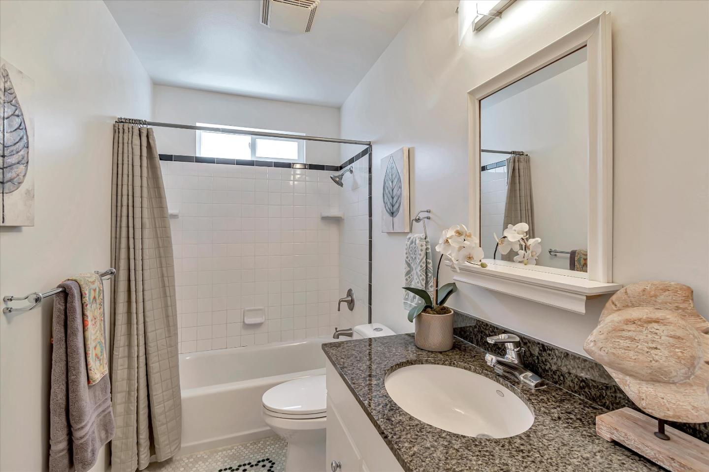 714 Cherry Avenue San Bruno, CA 94066 - Photo 21 of 29 a bathroom with a sink toilet tub and shower