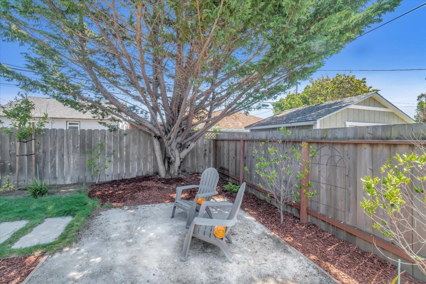714 Cherry Avenue San Bruno, CA 94066 - Photo 25 of 29 a backyard of a house with seating space