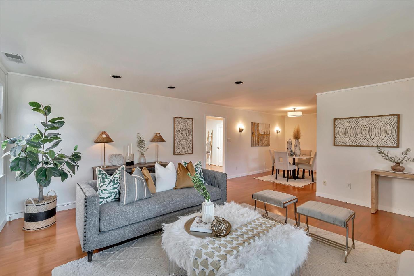 714 Cherry Avenue San Bruno, CA 94066 - Photo 6 of 29 a living room with furniture and a potted plant