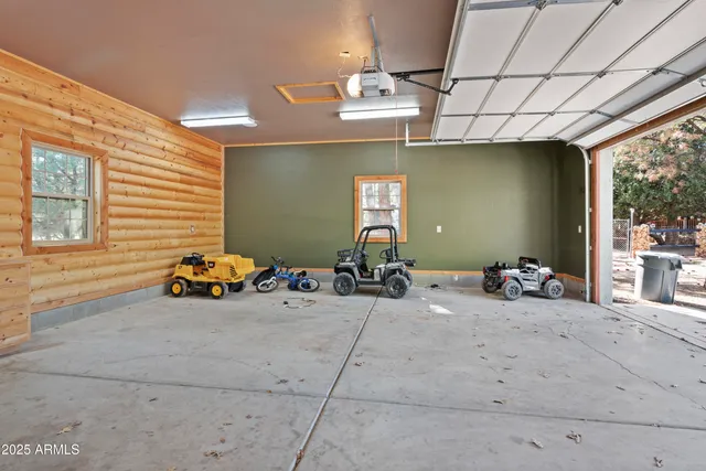 a view of a house with trees in the background