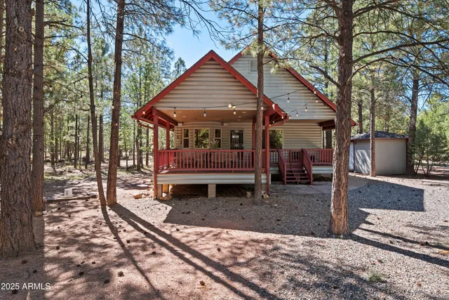 a backyard of a house with barbeque oven
