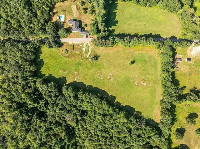 a view of a lake with a houses