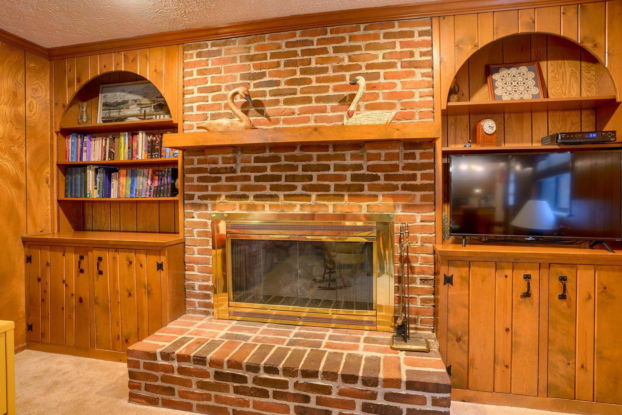 7770 Sanbrooke Road Dublin, OH 43016 - Photo 16 of 47 Built-ins and a gas fireplace