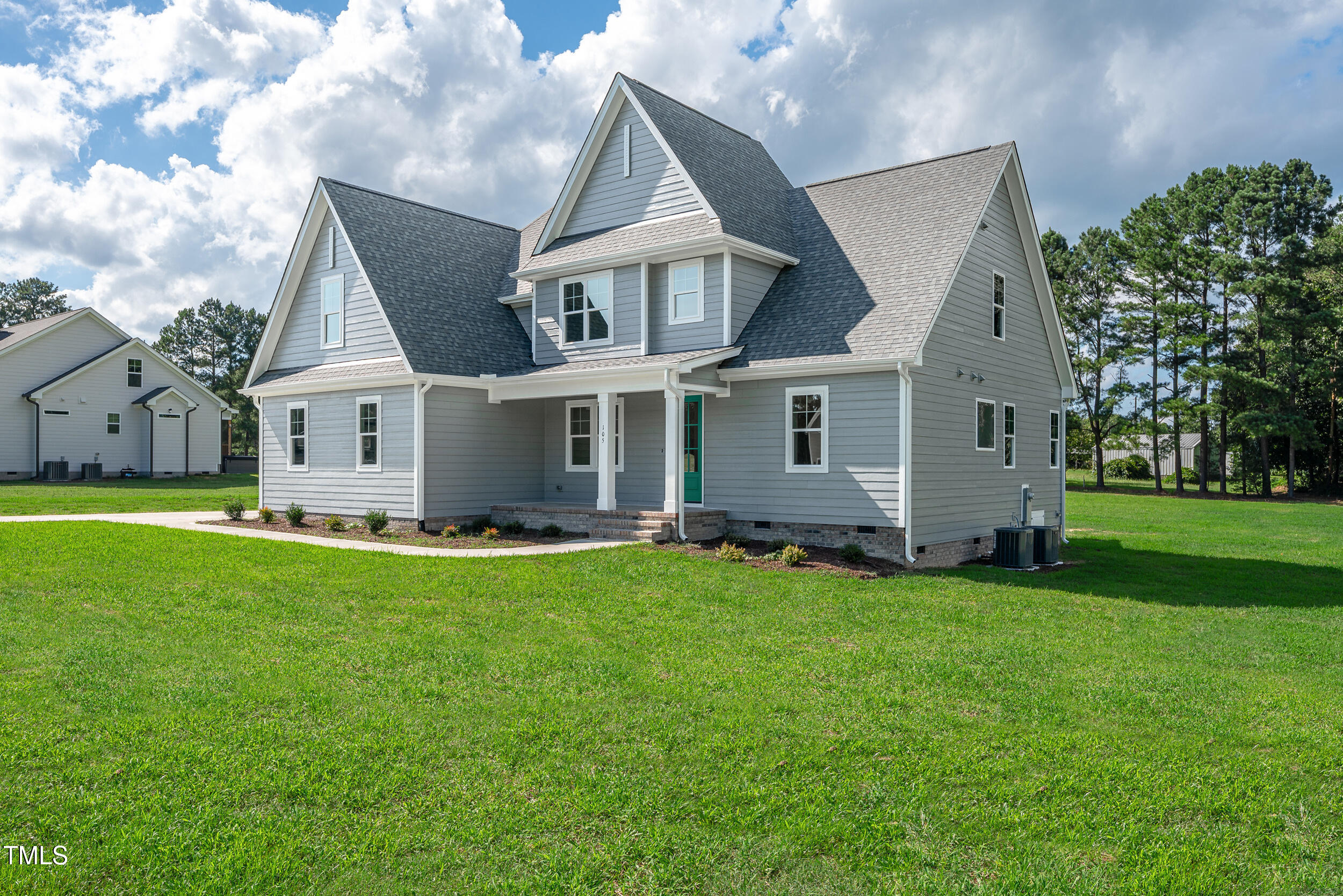 1693 Will Suitt Road Butner, NC 27522 - Photo 2 of 41 a view of a house with a backyard