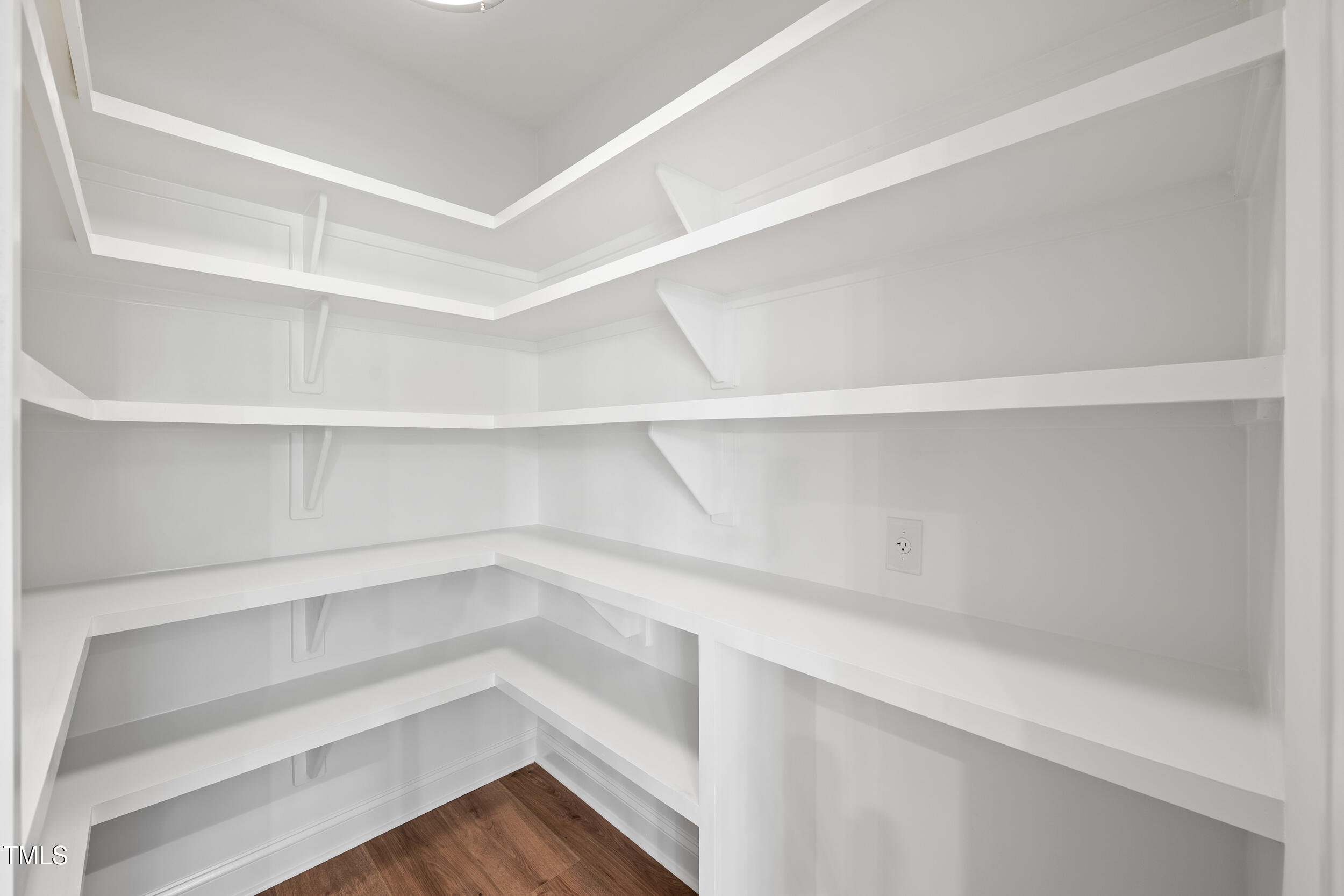 1693 Will Suitt Road Butner, NC 27522 - Photo 23 of 41 a view of an empty walk in closet