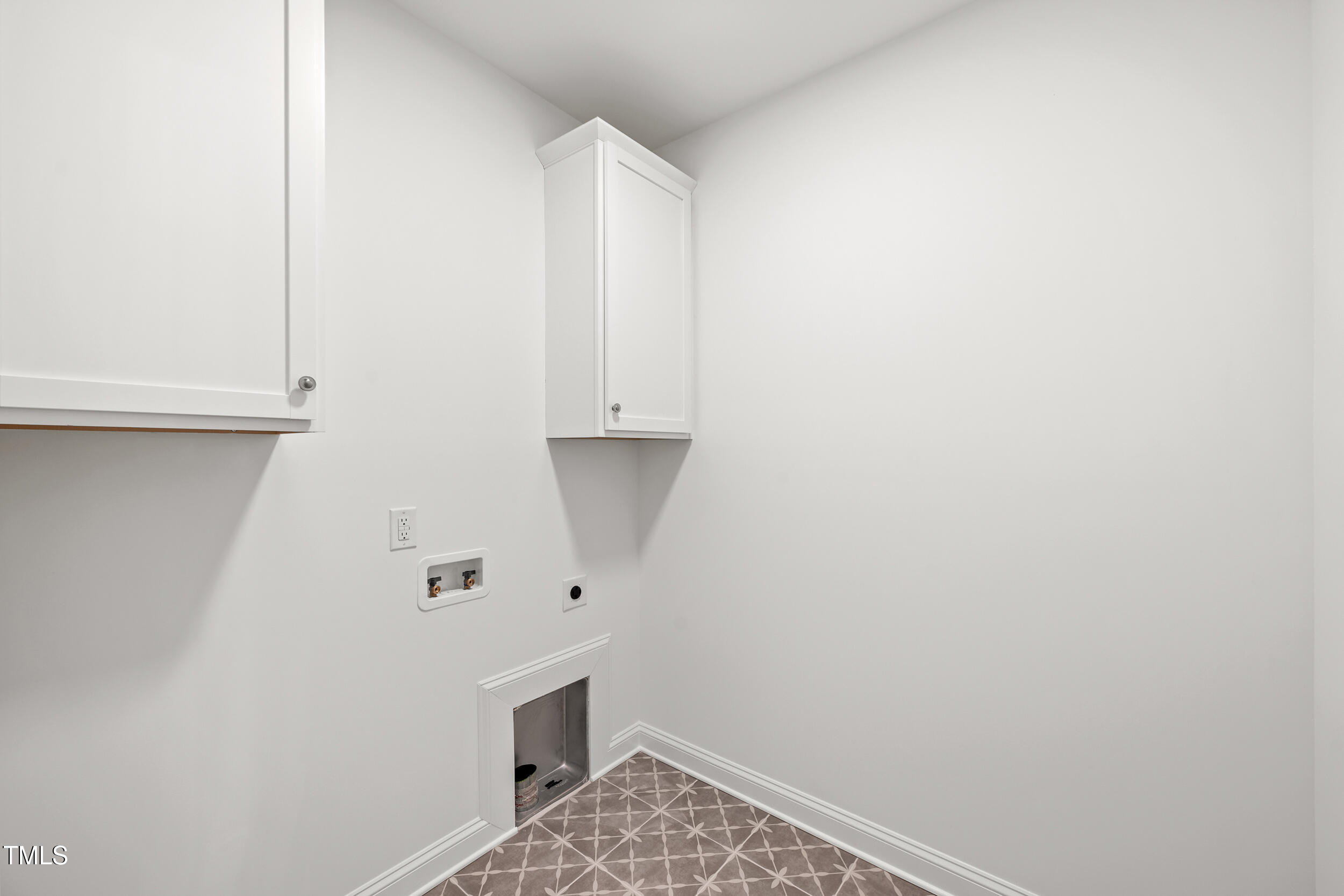 1693 Will Suitt Road Butner, NC 27522 - Photo 26 of 41 a room with storage and utility