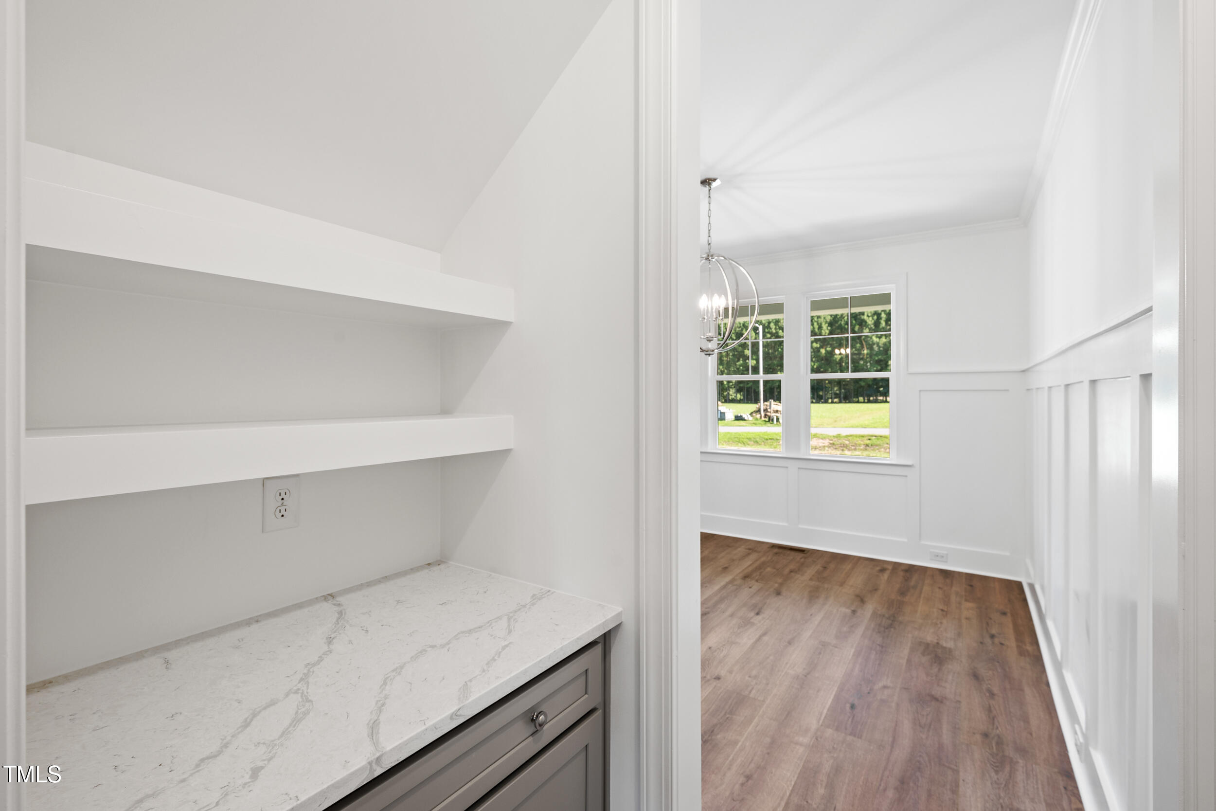 1693 Will Suitt Road Butner, NC 27522 - Photo 27 of 41 a view of room with window and wooden floor
