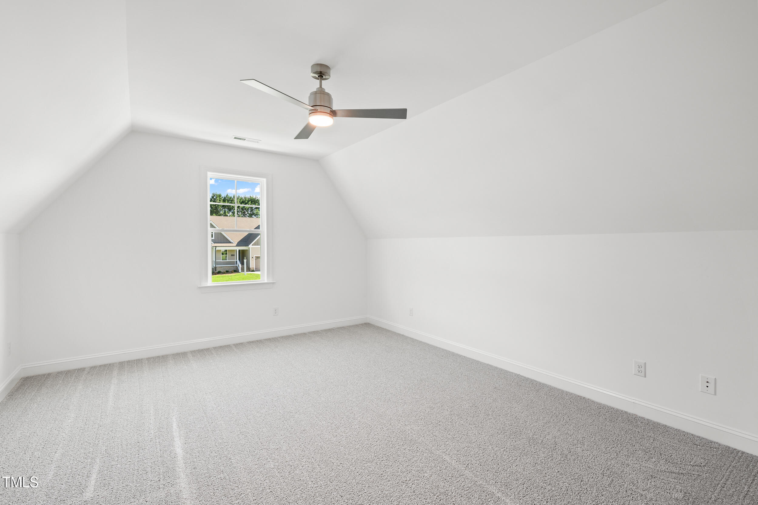 1693 Will Suitt Road Butner, NC 27522 - Photo 38 of 41 an empty room with windows and ceiling fan