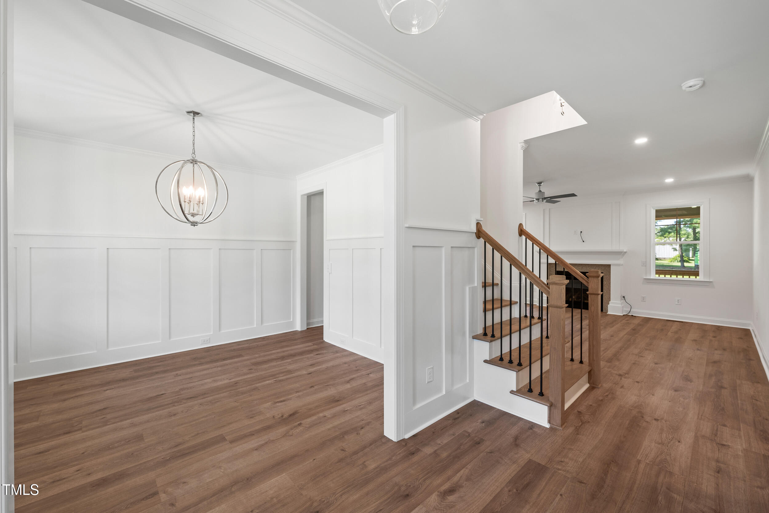 1693 Will Suitt Road Butner, NC 27522 - Photo 10 of 41 a view of a hallway with wooden floor