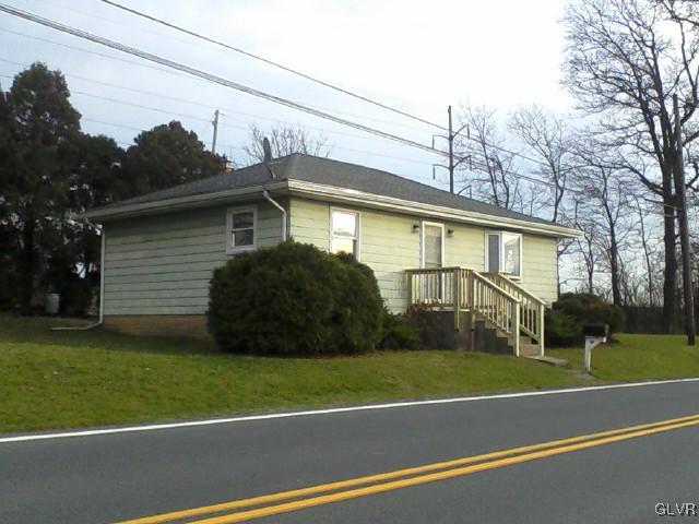 4788 Chapmans Road Allentown, PA 18104 - Photo 3 of 8 a view of a yard in front of a house