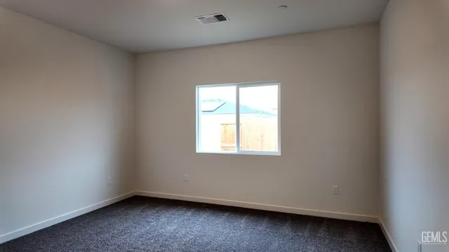 a bathroom with a granite countertop sink mirror and double